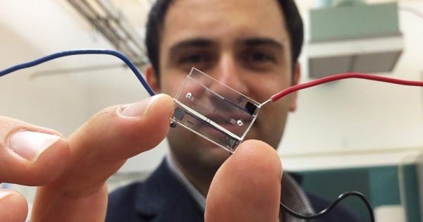 Prof. Fatih Sariglou with microfluidic device
